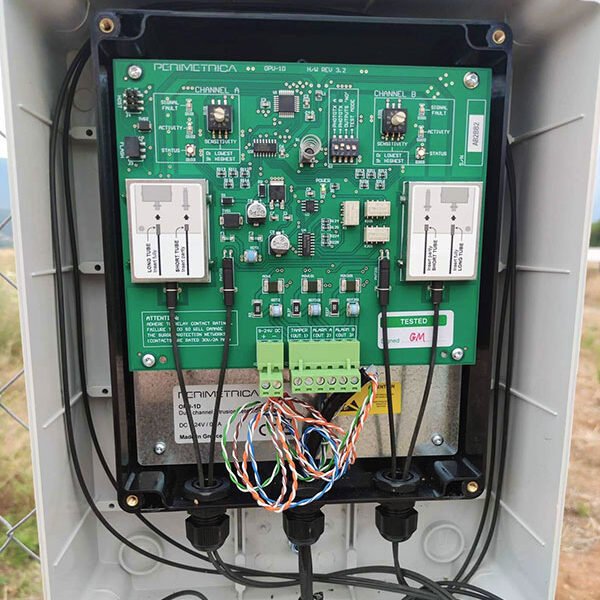 OPTIFENCE processor with open lid - Installation of perimeter alarm system in sloar power plant