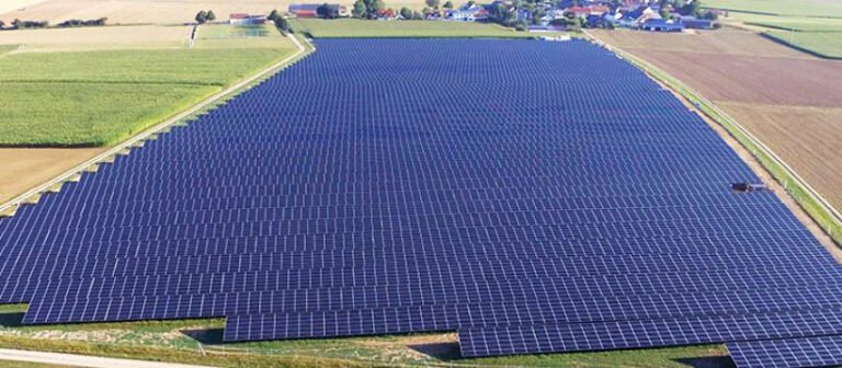 Aerial photo of large solar power plant with OPTIFENCE perimeter alarm