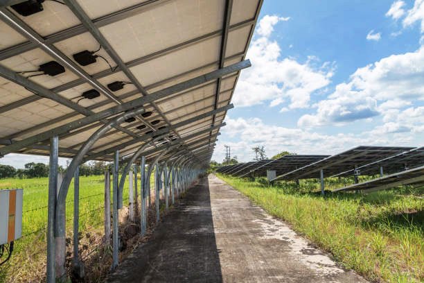 Back side of a solar panel string in solar power plant - FIBERLOOP provides complete antitheft protection to entire strings